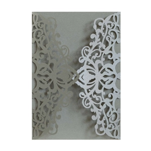 Laser-cut champagne silver invitation cover with elegant mandala pattern for weddings