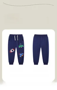 Detailed view of kids navy cotton joggers with rocket and spaceship embroidery