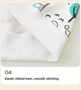 Détail de l'ourlet côtelé élastique et des coutures plates du sweat à capuche blanc