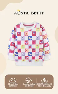 Detail of girls' sweatshirt featuring strawberry checkerboard pattern and ribbed cuffs