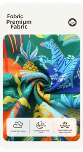 Macro view of 100% cotton dinosaur print fabric with tropical palm and zebra patterns