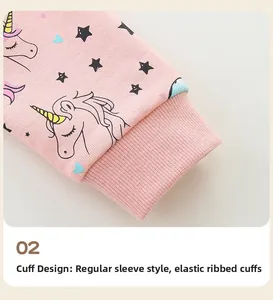 Close-up of pink girls' unicorn hoodie featuring elastic ribbed cuffs and soft cotton fabric