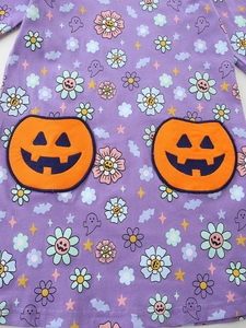 Robe Halloween pour fille violette avec poches citrouille et motifs fantômes festifs