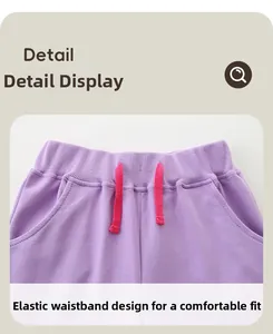 Détail du pantalon violet pour fille avec taille élastiquée et cordon de serrage rose