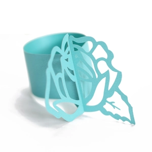 Detailed laser-cut light blue paper napkin ring featuring a 3D rose and leaf design
