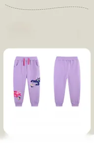 Détail du pantalon en coton violet pour filles avec broderie dinosaure et cordon rose ajustable
