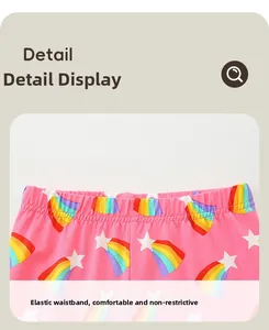 Détail de la taille élastique du legging rose pour fille avec motifs arc-en-ciel
