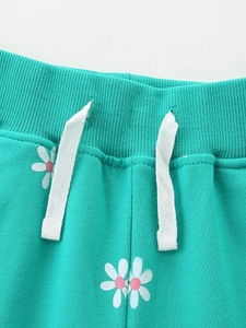 Pantalon de jogging menthe pour filles avec imprimé marguerites et cordon blanc