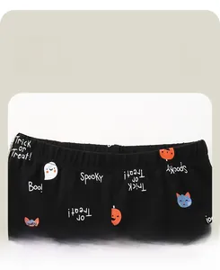 Detail view of elastic waistband on Halloween leggings with pumpkin and ghost prints