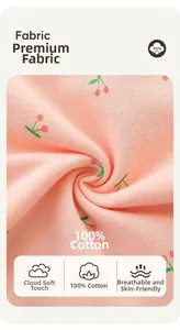 Close-up of 100% cotton pink fabric with red cherry print for breathable girls' pants
