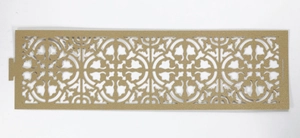 Macro detail of laser-cut golden hollow lace pattern for elegant wedding decorations