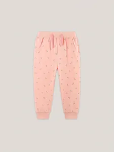 Pink cotton joggers for girls featuring all-over cherry prints and elastic drawstring waist
