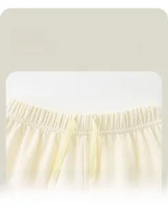 Close-up of kids joggers featuring an elastic waistband and tonal drawstring detail