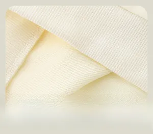 Close-up of neat stitching and ribbed knit texture on a cream-colored children sweatshirt