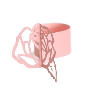 Pink laser-cut pearlescent paper napkin ring with an elegant rose flower design