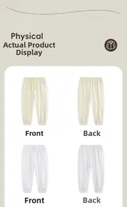 Detail view of boys cotton jogger pants in cream and white featuring elastic drawstring waist