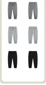 Detailed front and back view of kids drawstring joggers in dark grey, light grey, and black