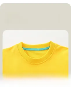 Detail of yellow cotton sweatshirt ribbed crewneck with durable blue binding tape