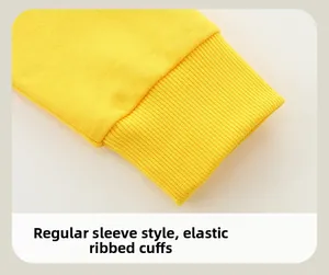 Detailed macro view of elastic ribbed cuffs on a bright yellow boys cotton sweatshirt
