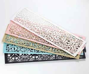Laser-cut hollow paper lampshades with ornate vintage patterns in five pearlescent colors
