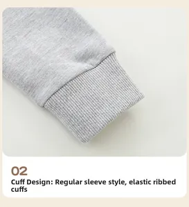 Detailed close-up of grey marl knit sweater showing the elastic ribbed cuff design