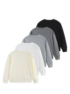 Set of five long sleeve crewneck sweatshirts in basic solid colors for children