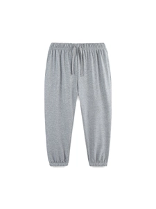 Classic grey cotton jogger pants for boys featuring elastic waistband and drawstring