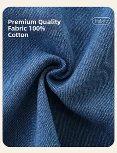 Detail of 100% cotton blue denim fabric showing soft texture and premium twill weave