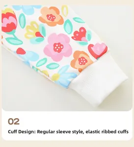 Close-up of elastic ribbed cuffs on a girls' floral print cotton sweatshirt