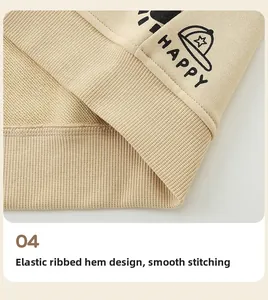 Detail of elastic ribbed hem on kids' beige zip hoodie featuring a happy graphic print