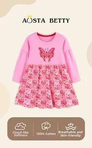 Detail of 100% cotton pink toddler dress featuring butterfly embroidery and floral print