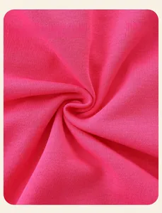 Close-up of premium rose red knitted fabric texture with soft cotton blend detail