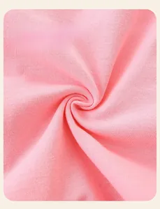 Detail showing 100% cotton pink knit fabric texture for girls princess dress