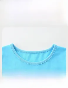 Detailed view of the comfortable round neckline and stitching on a sky blue cotton dress