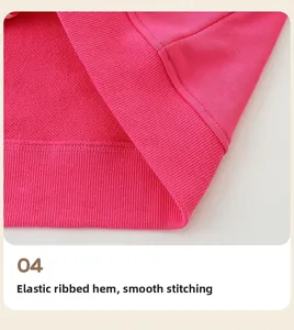 Detail of pink hoodie hem showing elastic ribbed fabric and neat stitching craftsmanship
