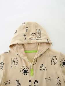 Kids beige zip-up hoodie with graffiti skate prints and neon green contrast details