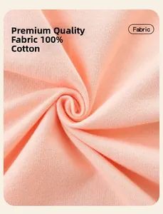 Close-up of 100% cotton pink knit fabric showing soft texture and fine weave