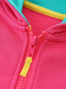 Pink girls unicorn hoodie with contrast green lining and yellow zipper pull details