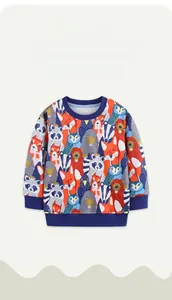 Close-up of boys sweatshirt with colorful cartoon animal print and blue ribbed cuffs