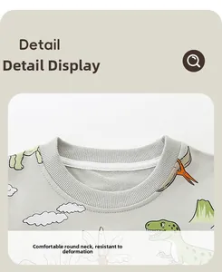 Macro detail of the comfortable ribbed crew neck on this gray cotton dinosaur sweatshirt
