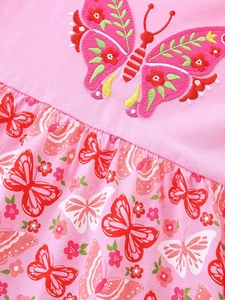 Pink long-sleeve girl dress featuring butterfly embroidery and floral pattern print