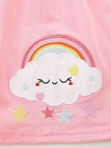 Pink girls princess dress featuring rainbow and smiling cloud embroidery details