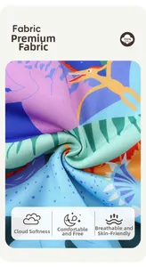 Close-up of 100% cotton fabric with colorful dinosaur print for kid's sweatshirt