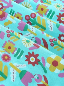 Robe de princesse pour fille en bleu sarcelle avec des motifs de fleurs colorées