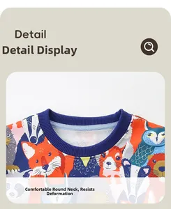 Detail view of the comfortable blue ribbed crew neck and cartoon animal patterns on the sweatshirt