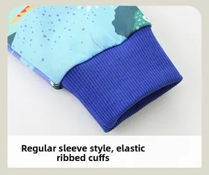 Close-up of elastic ribbed blue cuffs on a kids sweatshirt with dinosaur prints