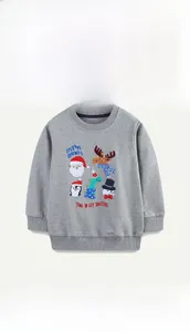 Detail of grey cotton sweatshirt featuring colorful Christmas cartoon prints for children