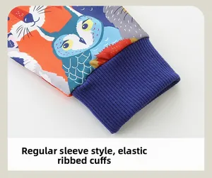 Detail of elastic ribbed cuffs on a kid's autumn sweatshirt with cute cartoon prints