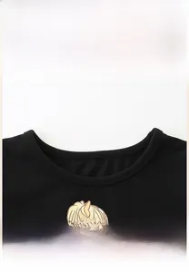 Close-up of durable round neckline and soft cotton mesh on kids' cartoon dress