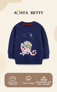 Close-up of girls navy cotton sweatshirt featuring detailed floral dragon embroidery and soft texture